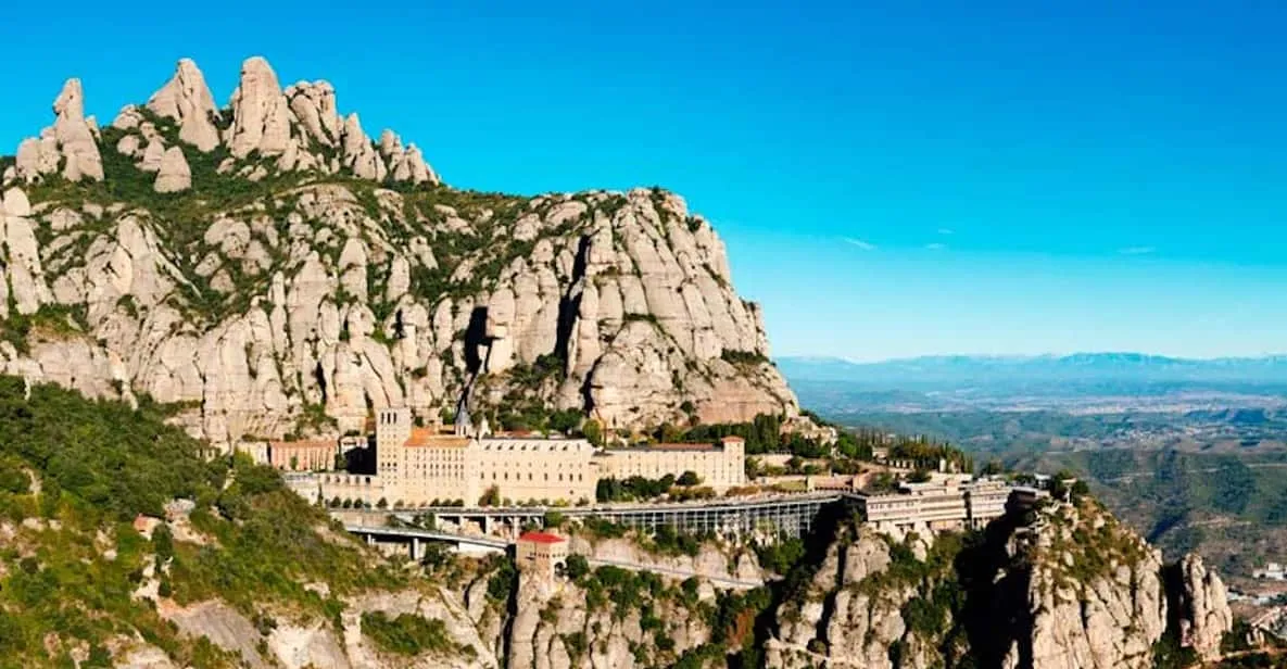 Serrated peaks rising above the Montserrat monastery, a mountain day trip beyond the museums in Barcelona, Spain